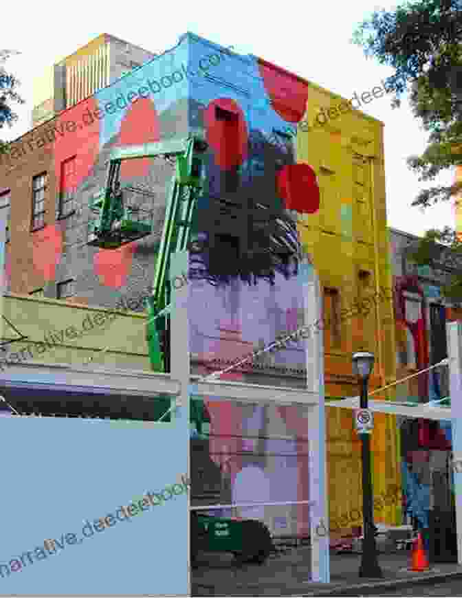 A Local Artist Creating A Vibrant Mural On The Side Of An Abandoned Building In South Atlanta Live From The Southside Magazine: Local Texas Magazine On San Antonio S Southside And Surrounding Areas