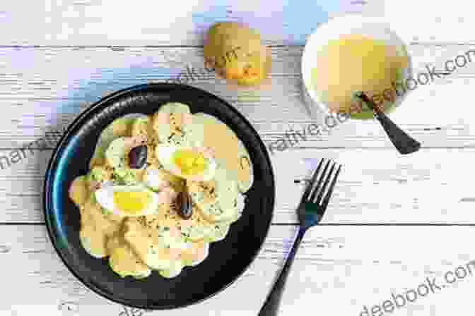 Papa A La Huancaína, A Peruvian Dish Of Boiled Potatoes Topped With A Creamy Aji Amarillo Sauce Authentic Peru Cookbook: Traditional And Famous Recipes From Peru
