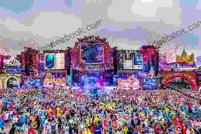 The Main Stage At Tomorrowland 2019, With A Crowd Of People Dancing In Front Of A Large LED Screen The Sound Of Tomorrow: How Electronic Music Was Smuggled Into The Mainstream